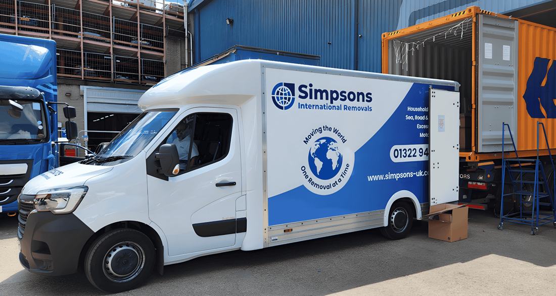 Simpsons removals crew loading a shipping container